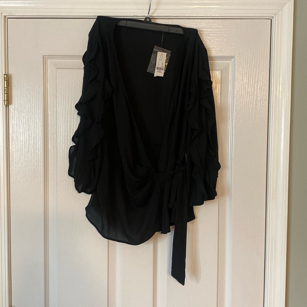 Dress too, with ruffled sleeved. Smoke and pet free home